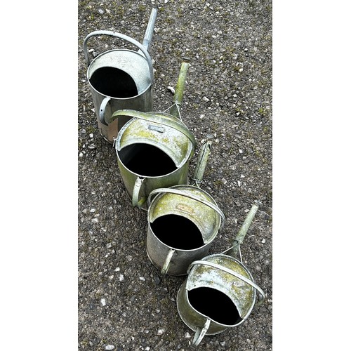 62A - Four varying vintage galvanised watering cans (4)