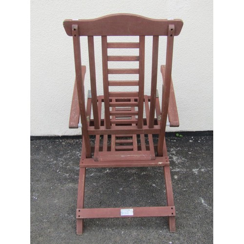 257 - A stained hardwood folding steamer type chair with slatted seat and back