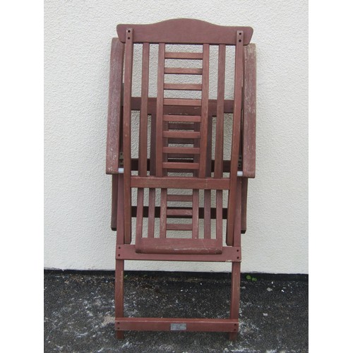 257 - A stained hardwood folding steamer type chair with slatted seat and back