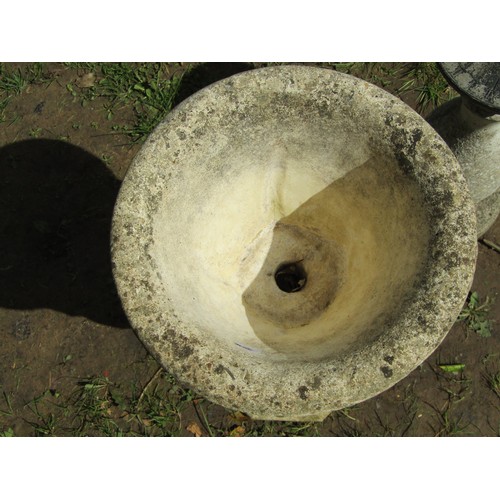 269 - A small weathered cast composition stone garden urn, the circular bowl with flared rim and repeating... 