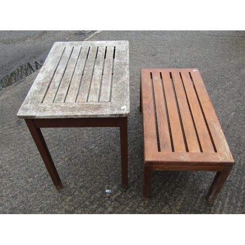 273 - A vintage stained and weathered Lister burma teak garden table of rectangular form with slatted top ... 