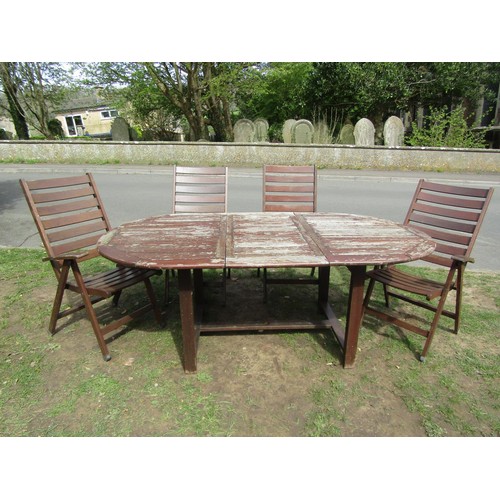 278 - A stained and weathered hardwood garden suite comprising table with oval slatted top and single addi... 