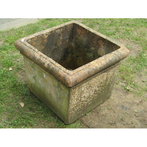 290 - A weathered square tapered terracotta planter with moulded rim (af), 41 cm high x 52 cm square