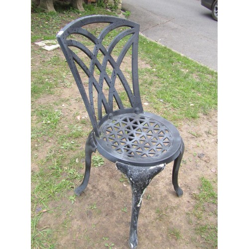 295 - A contemporary cast alloy three piece garden Bistro set with pierced lattice detail, the table 60cm ... 