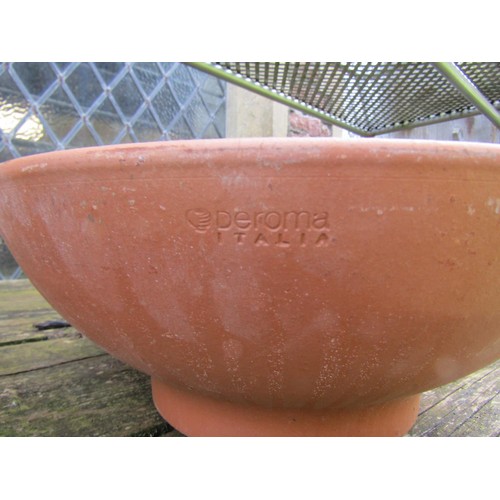 211 - Twelve shallow squat circular terracotta planters (varying size), the larger examples 14 cm x 36 cm ... 