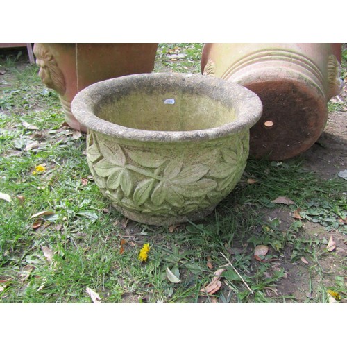 237 - A pair of weathered terracotta garden planters of circular tapered form with lions mask detail 30 cm... 