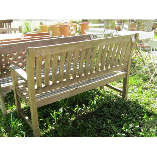 154 - A weathered ‘Canterbury Collection’ teak garden bench with curved slatted seat, back and arms (AF) 1... 