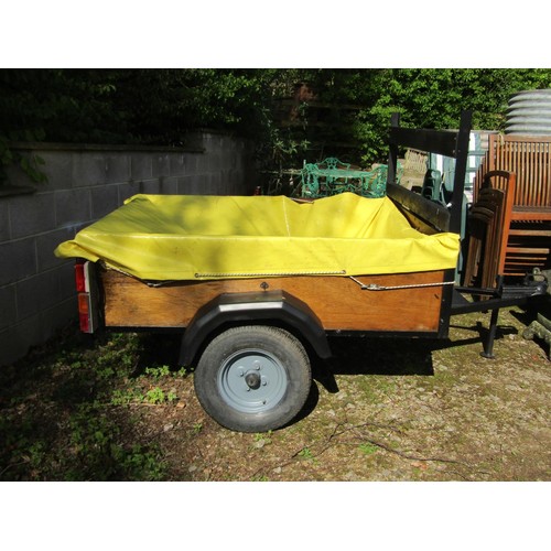 200 - A two wheel car trailer with wooden body and steel framework, the main bed 154 x 123cm, 42cm high