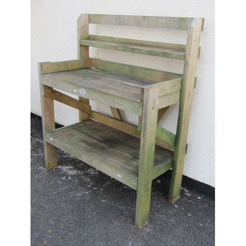 511 - A Hutton two tier pine potting table/bench, 120 cm high x 100 cm x 48 cm