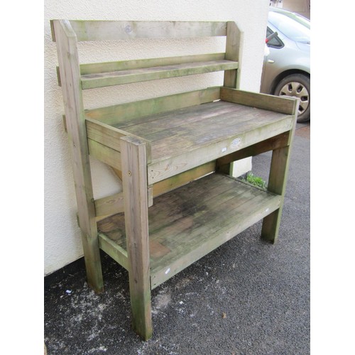 511 - A Hutton two tier pine potting table/bench, 120 cm high x 100 cm x 48 cm