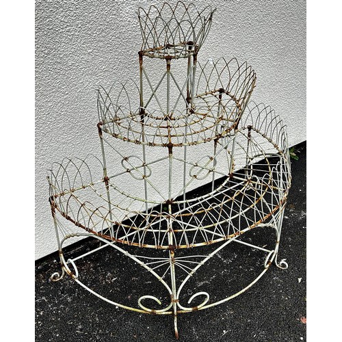 516 - A weathered Victorian style wire work freestanding three tier conservatory/garden planter with latti... 