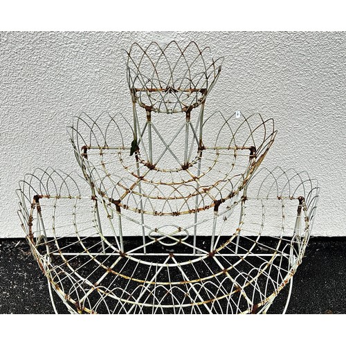 516 - A weathered Victorian style wire work freestanding three tier conservatory/garden planter with latti... 