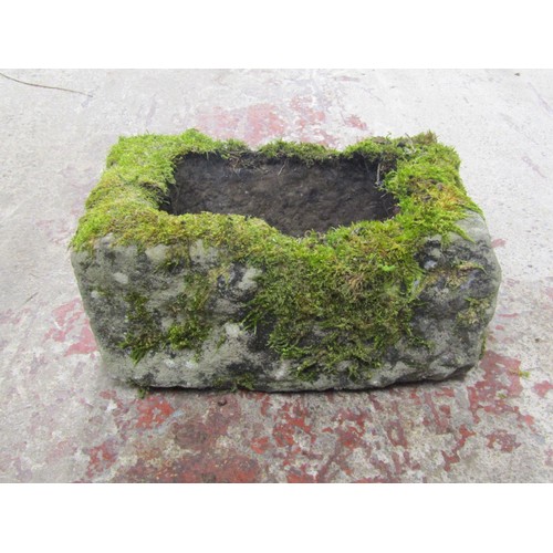 521 - A small shallow but thick walled rectangular natural stone trough, 20cm high x 48cm x 30cm