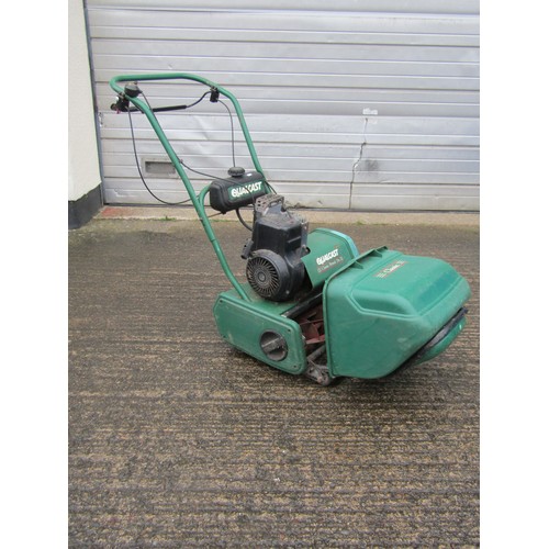 527 - A Qualcast Classic petrol 35S cylinder lawn mower with grass collection box