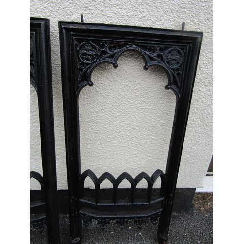 532 - A matched set of four gothic 19th century cast iron fire place surrounds, each measuring 84 x 39