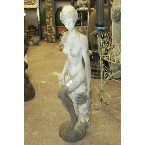 506 - A weathered carved white marble figure in the form of a classically presented female nude (unsigned ... 