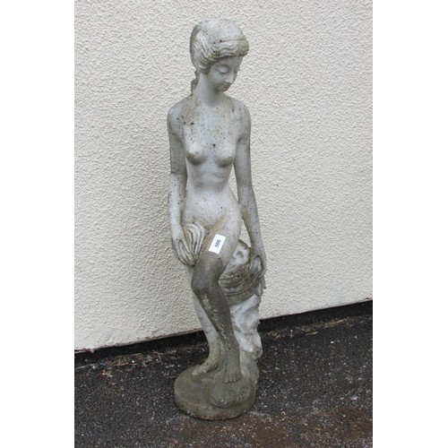 506 - A weathered carved white marble figure in the form of a classically presented female nude (unsigned ... 