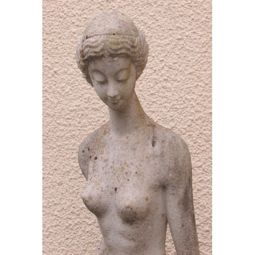 506 - A weathered carved white marble figure in the form of a classically presented female nude (unsigned ... 