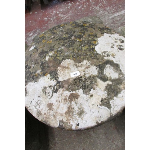 507 - A weathered carved natural stone staddle stone and associated cap, 70cm high, 60cm diameter.