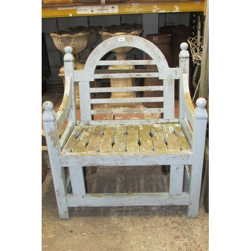 509 - A weathered teak garden chair with worn pale blue painted finish. Wide generous slatted seat & back ... 