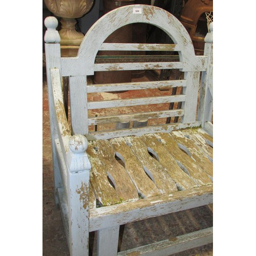 509 - A weathered teak garden chair with worn pale blue painted finish. Wide generous slatted seat & back ... 