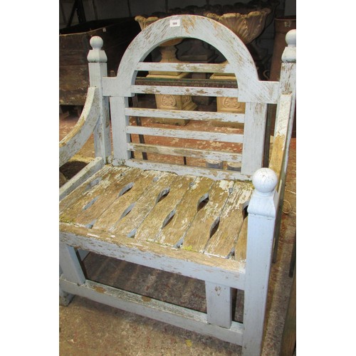 509 - A weathered teak garden chair with worn pale blue painted finish. Wide generous slatted seat & back ... 