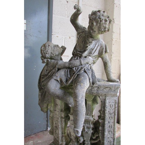 517 - A 19th century weathered marble garden figure group, in the form of jostling infants on a sectional ... 