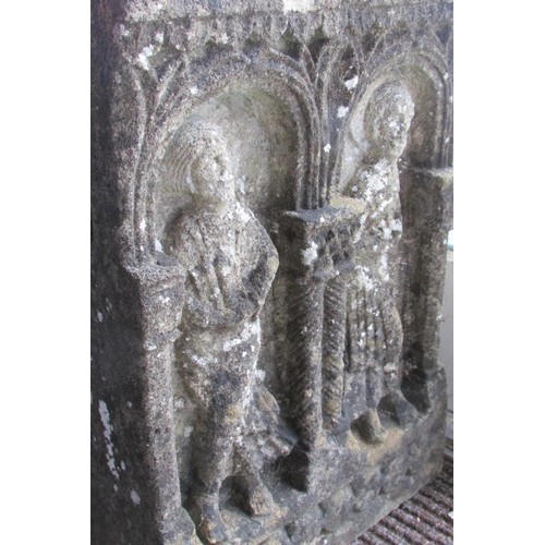 531 - A weathered carved limestone panel in the old English / medieval style, decorated with stylised figu... 