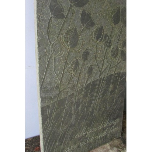 537 - A carved slate panel with carved thistles and poppies design in a contoured landscape - 'All good th... 