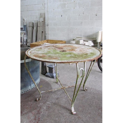 A weathered rustic painted metalwork patio / garden table, with tubular framework, 70cm high, 95cm diameter