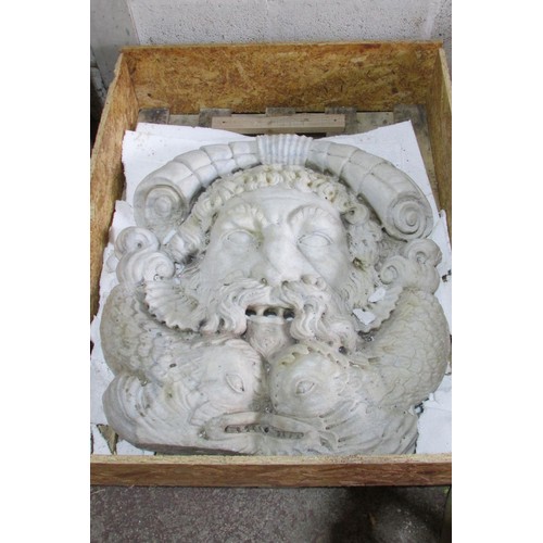 548 - A large and impressive continental carved marble fountain head, detailing a mask of Poseidon above s... 