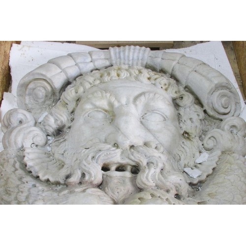 548 - A large and impressive continental carved marble fountain head, detailing a mask of Poseidon above s... 