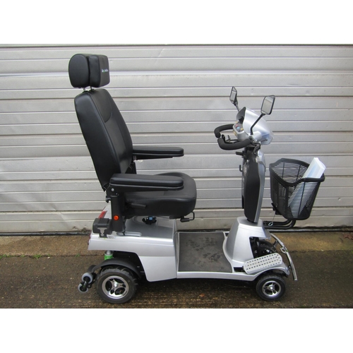 561 - A Quingo Vitess II Mobility Scooter like new condition with only 17 hours on the clock, pair of bran... 