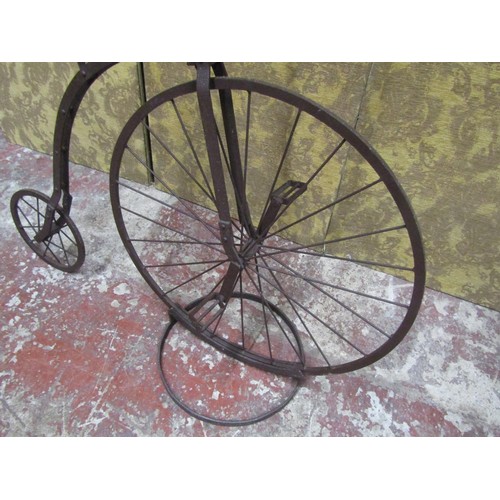 562A - A decorative model penny farthing bicycle, 105cm high