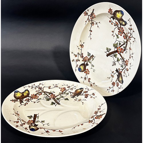 7 - A Victorian dinner service by George Jones & Sons Almonds pattern showing finches amongst hawthorns ... 