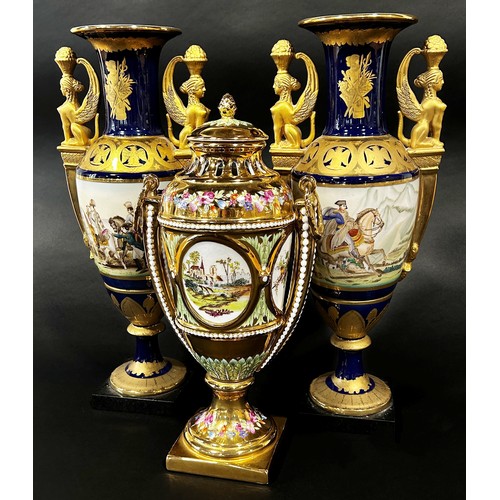 20 - A pair of Empire style vases the main bodies in a blue and gilt colourway with painted panels depict... 