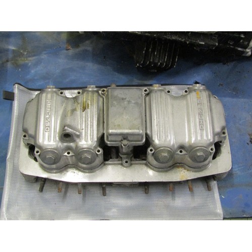 571 - Five motorcycle engine/blocks, together with various cylinder heads etc