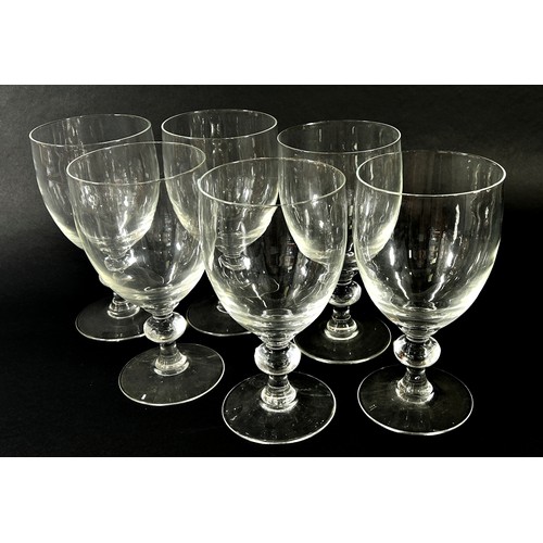 84 - A set of six oversized wine glasses or sundae glasses with baluster stem, 20cm high x 10cm diameter.