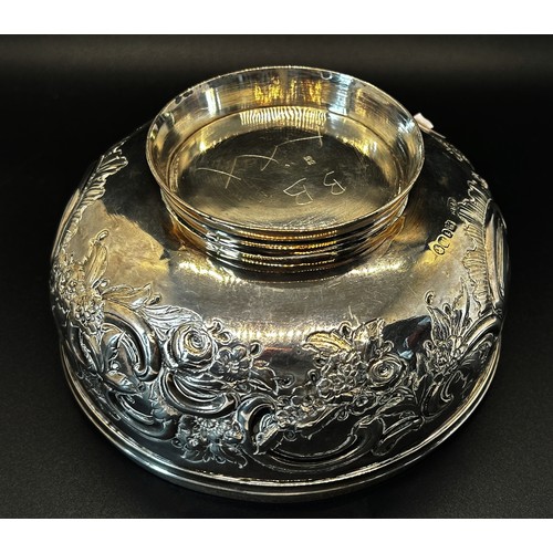 142 - A Victorian silver bowl with embossed and engraved floral decoration, London 1847, maker Thomas Hugh... 