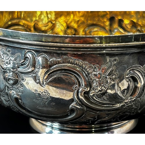 142 - A Victorian silver bowl with embossed and engraved floral decoration, London 1847, maker Thomas Hugh... 