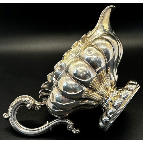 144 - A William IV silver creamer of squat pumpkin form, London 1834, maker Benoni Stephens, 19cm wide, 8.... 