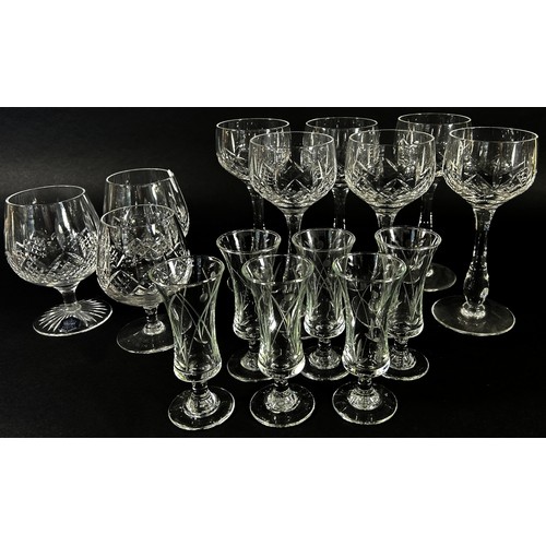 103 - A good suite of Stuart Crystal glass ware including wine glasses, brandy, tumblers, sherry, liqueur ... 