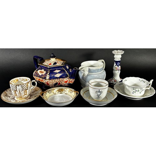 54 - A small collection of 19th century English porcelain tea cups and saucers, hexagonal teapot with han... 