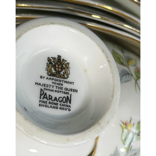 4 - A Paragon tea service for twelve with repeating rosebud detail