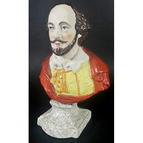 37 - A 19th century Staffordshire Prattware figure of William Shakespeare on a simulated marble style bas... 