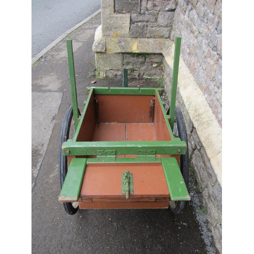 1002 - A vintage home built hand cart with original green and brown painted  finish