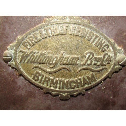 1029 - A Whittingham Brothers fire and Thief Resisting Safe with brass mounts (key in office) 67cm high x 3... 