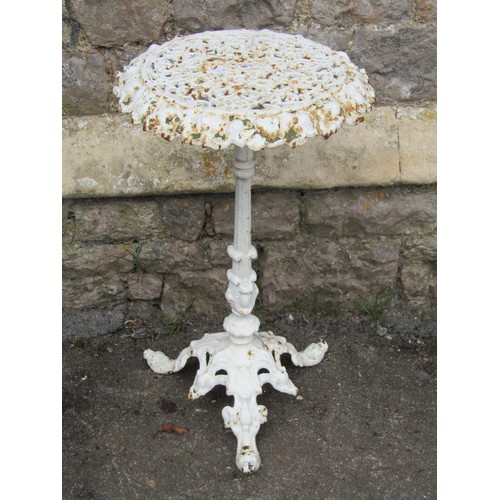1031 - A small 19th century cast iron conservatory table, the circular top with pierced detail, fluted colu... 