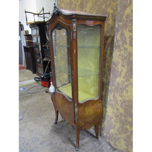 1102 - A French Empire style Remi-Martin cabinet partially glazed with gilt brass mounts, 170cm high x 75cm... 