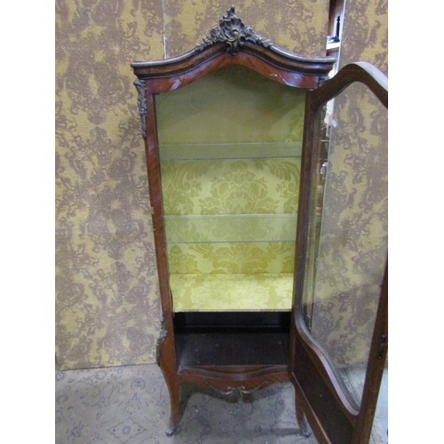 1102 - A French Empire style Remi-Martin cabinet partially glazed with gilt brass mounts, 170cm high x 75cm... 